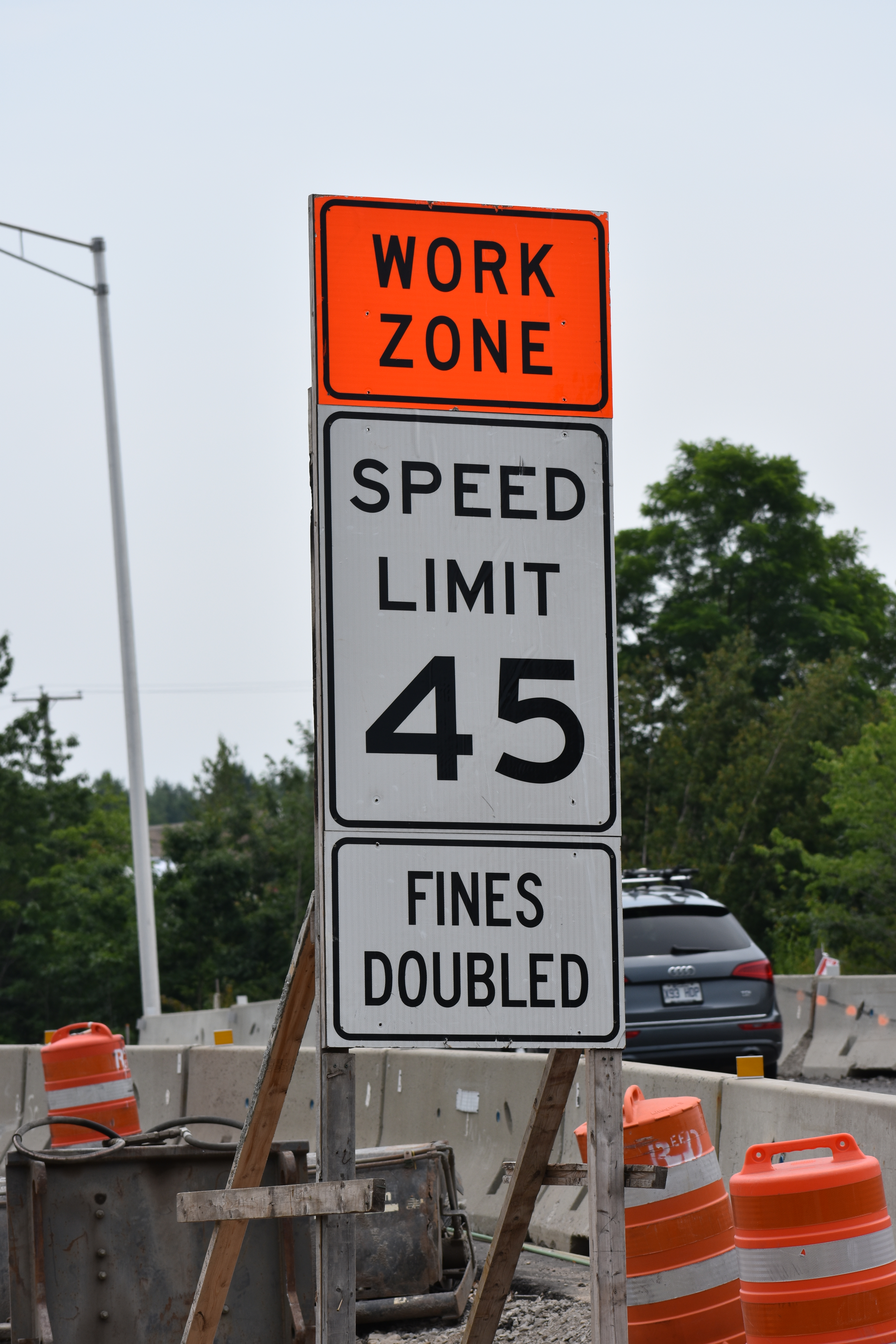  Reduced speed limit in effect signage placed at the start of a work zone