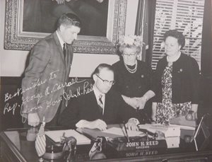 Reed-signing-bill-(2).jpg