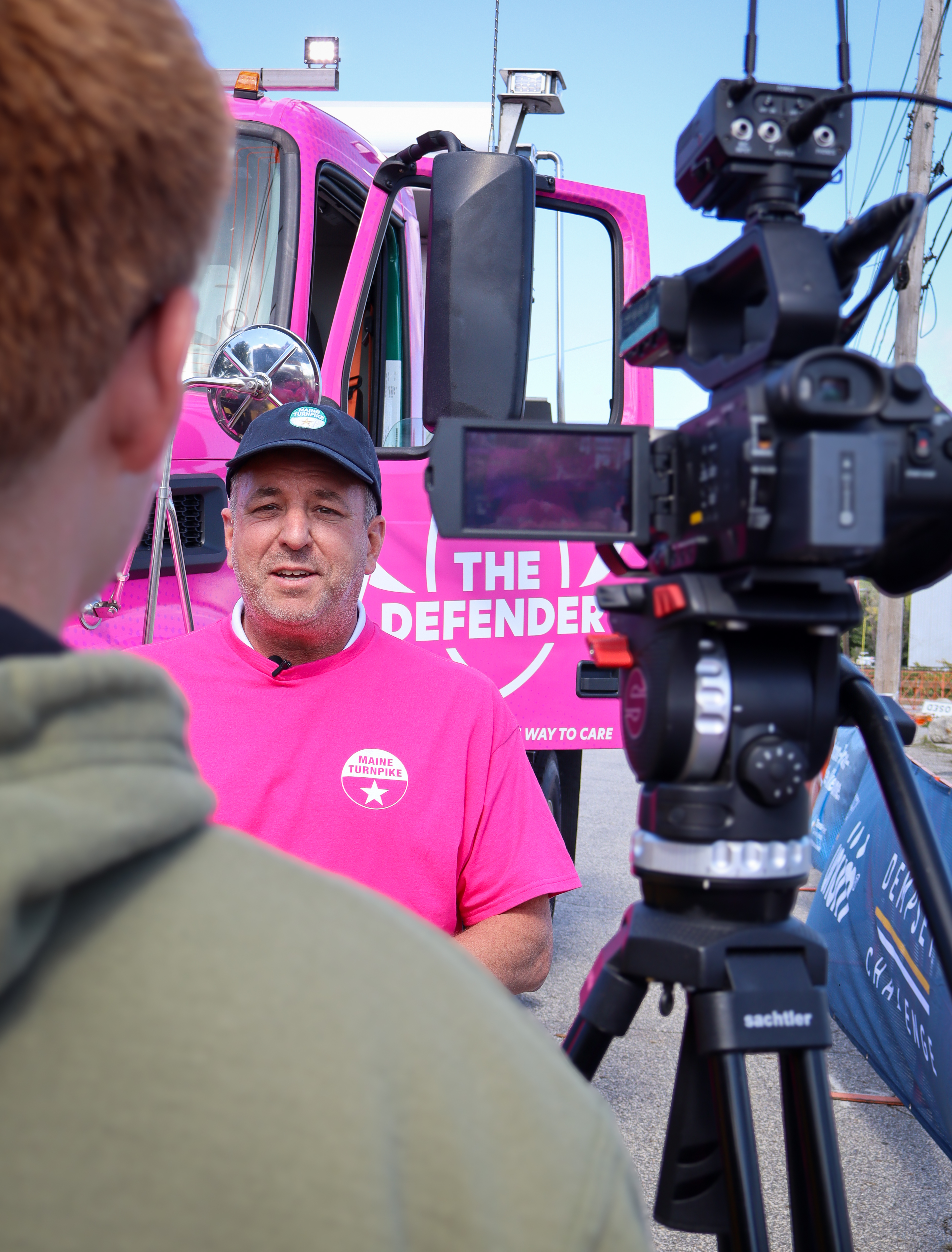 MTA Executive Director Andre Briere speaks with press at the unveiling of The Defender snow plow